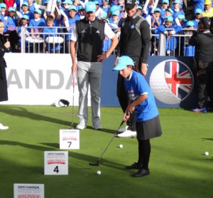 youngster-helps-wood-pietersen-pressure-putt